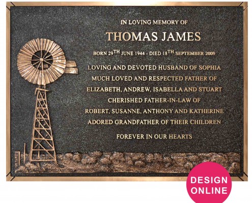 bronze plaque with carved windmill scene