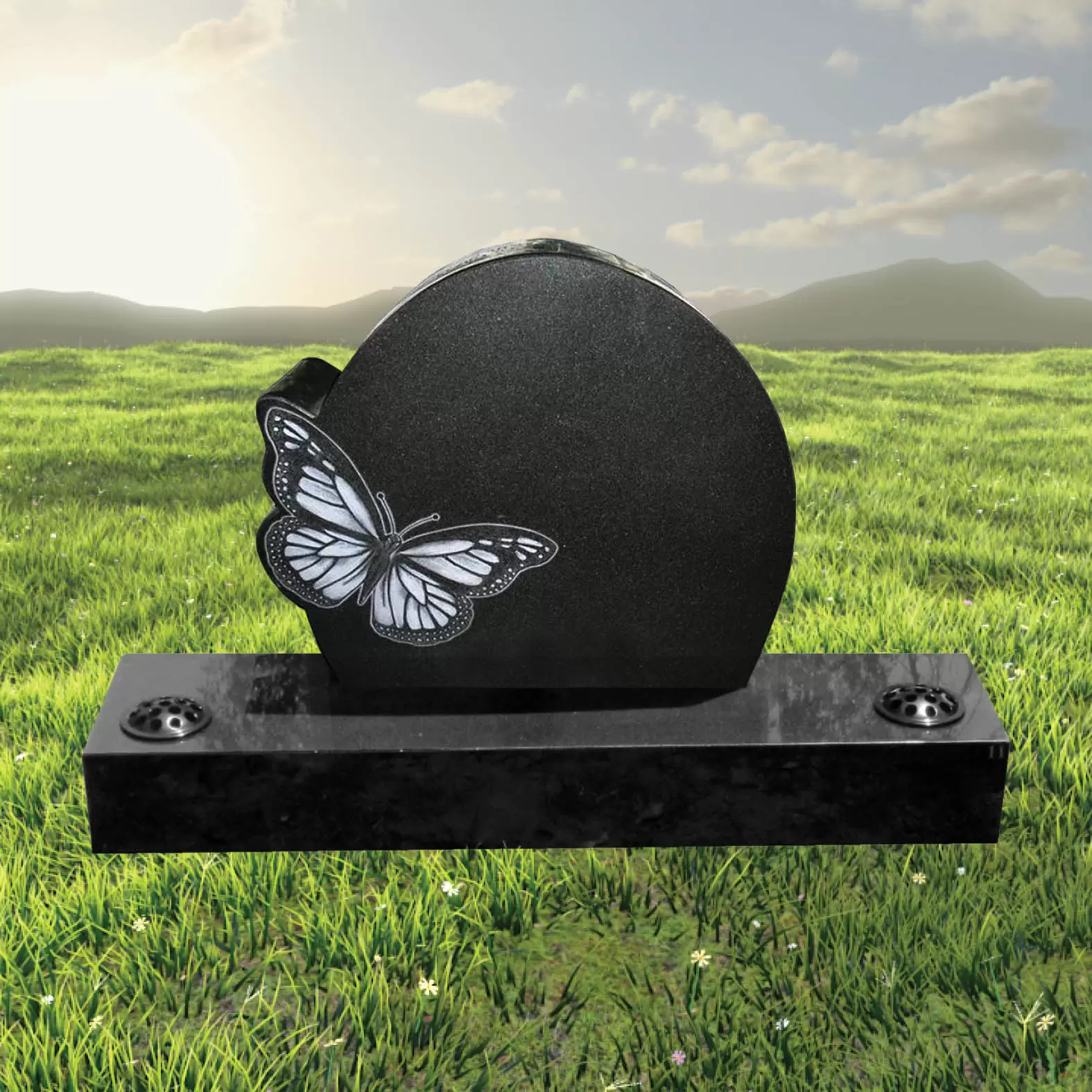 Black granite headstone with raised butterfly motif