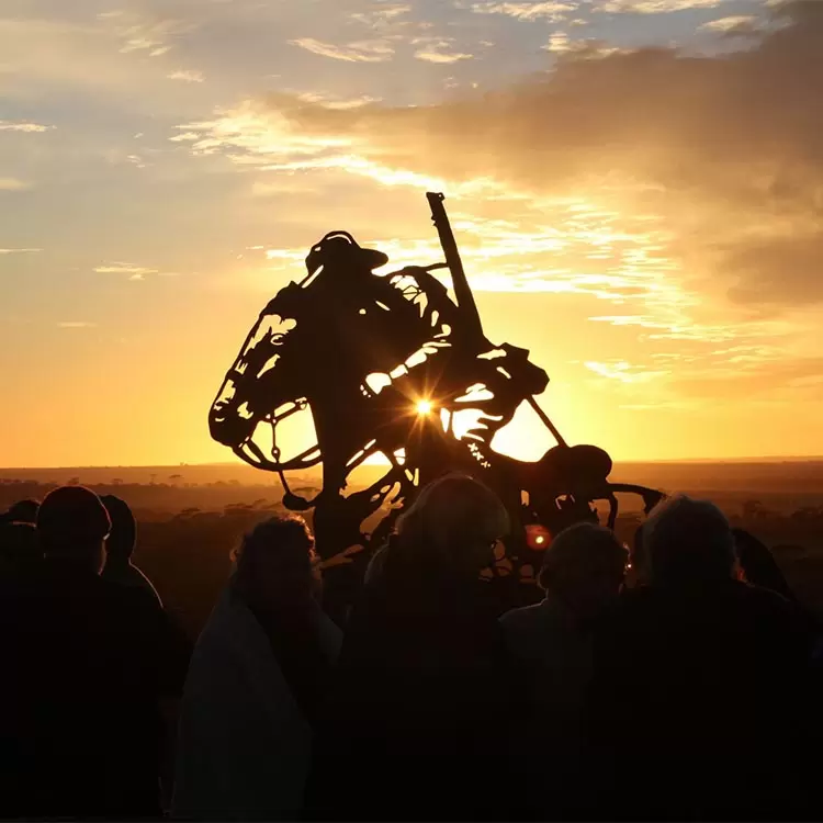 WA 10th Light Horse Regiment corten steel horse memorial silhouetted against the rising sun at Kondinin