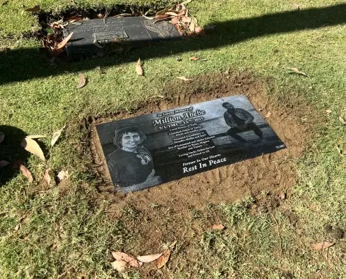 Laser etched black granite plaque installed at the cemetery